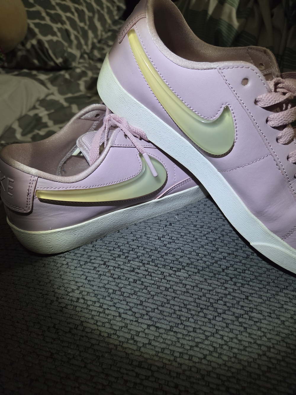 Nike Women’s Pink Low-Top Sneakers with Iridescent Yellow Swoosh